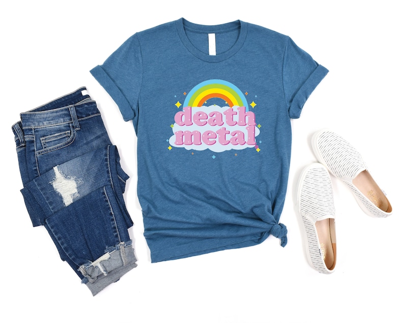 May include: A blue t-shirt with a rainbow and the words "death metal" in pink letters.