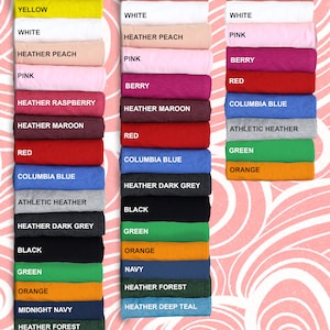 May include: A chart showing the colour options for adult, youth, and toddler t-shirts. The colours include mauve, yellow, white, heather peach, pink, berry, heather raspberry, heather maroon, red, columbia blue, athletic heather, heather dark grey, black, green, orange, midnight navy, heather forest, and heather deep teal.