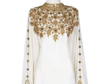 white and gold gown