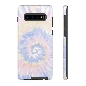 May include: A phone case with a tie-dye pattern in shades of pink, blue, and white. The case is designed for a Samsung Galaxy S10.