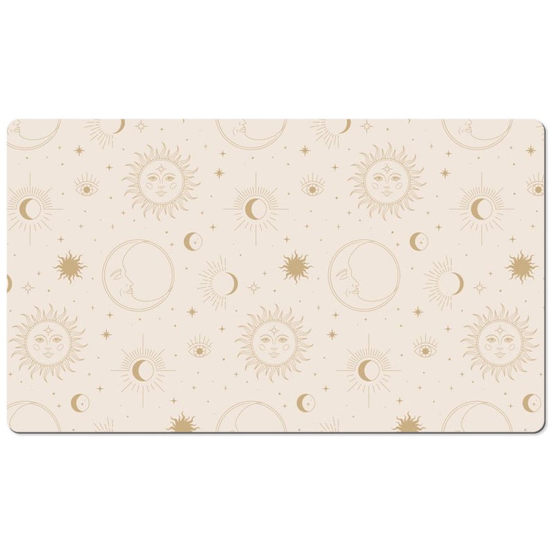 May include: A beige background with a repeating pattern of gold suns, moons, and stars. The suns and moons have faces drawn on them.
