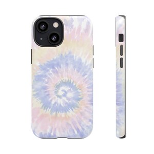 May include: A phone case with a tie-dye pattern in shades of pink, blue, and white. The case has a black border and a cutout for the camera lens.