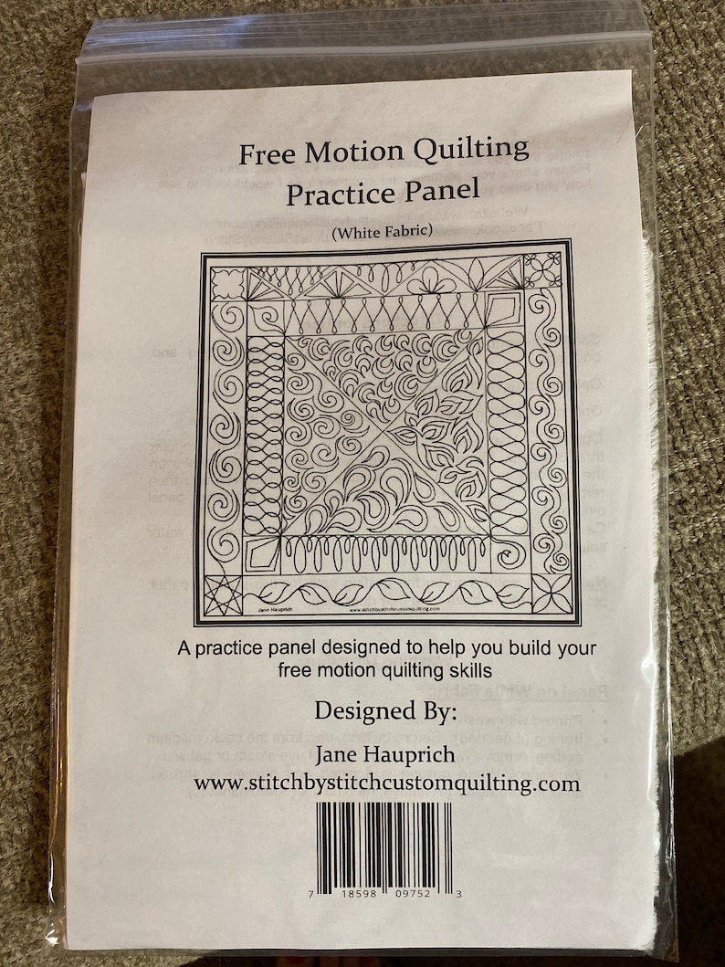 May include: A white fabric practice panel for free motion quilting. The panel features a variety of quilting designs, including swirls, loops, and geometric patterns. The panel is designed to help you build your free motion quilting skills. Designed by Jane Hauprich. www.stitchbystitchcustomquilting.com