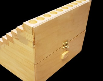 Now a Wooden Display Rack with a storage drawer.  10 Rows hold 100 Roll-on Bottles - 21mm dia. Now with free engraving of your company logo