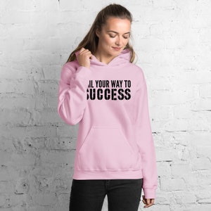 May include: Pink hoodie with a black graphic that says "Go all your way to success".