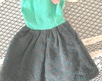 Vintage 1960 Skipper clone dress, with flower.  This outfit is in used condition.