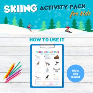 The image is an advertisement for a skiing activity pack for kids. It features a blue clipboard with a worksheet titled "Name That Animal" and a snowy winter landscape with a skier and snowboarder in the background. The clipboard and worksheet are placed on a white wooden surface, along with a box of colored pencils.