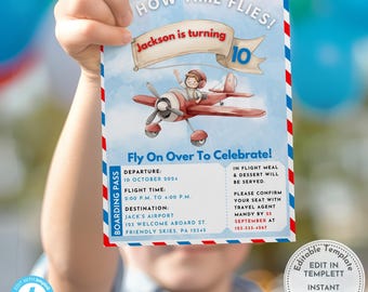 May include: A birthday party invitation featuring a red airplane illustration with a pilot. The invitation has a blue sky background and text that reads "How Time Flies!" and "Fly On Over To Celebrate!" The invitation is held by a person.