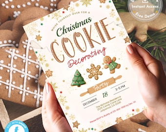 May include: A Christmas Cookie Decorating party invitation held by hands. The invitation features a festive design with gingerbread men, snowflakes, and a Christmas tree. The text reads "Whisk Yourself Over For A Christmas Cookie Decorating Party".