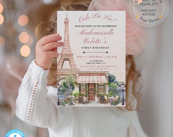 May include: A pink and white invitation card with the Eiffel Tower and a French cafe illustration. The card reads "Ooh La La!" and invites guests to celebrate Mademoiselle Colette's first birthday. The card includes the date, time, and location.