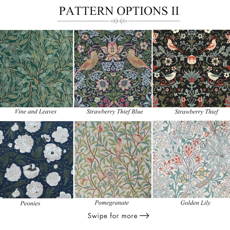 May include: A dark blue tablecloth with a floral pattern in shades of green, red, and beige. The tablecloth is draped over a wooden table, with a matching napkin and a white vase visible. The table is set with plates, bowls, and wine glasses.