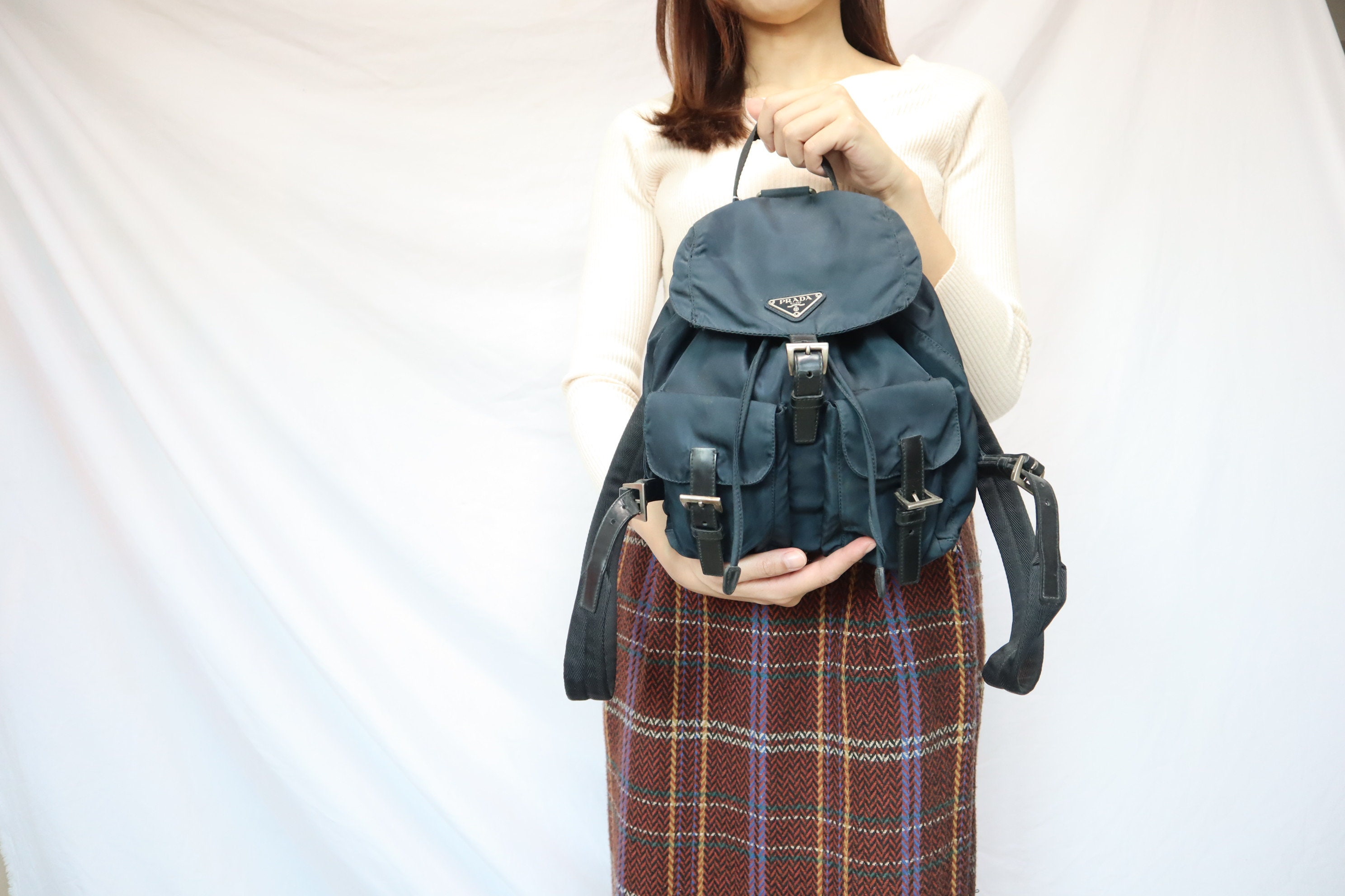 Prada backpack size sale