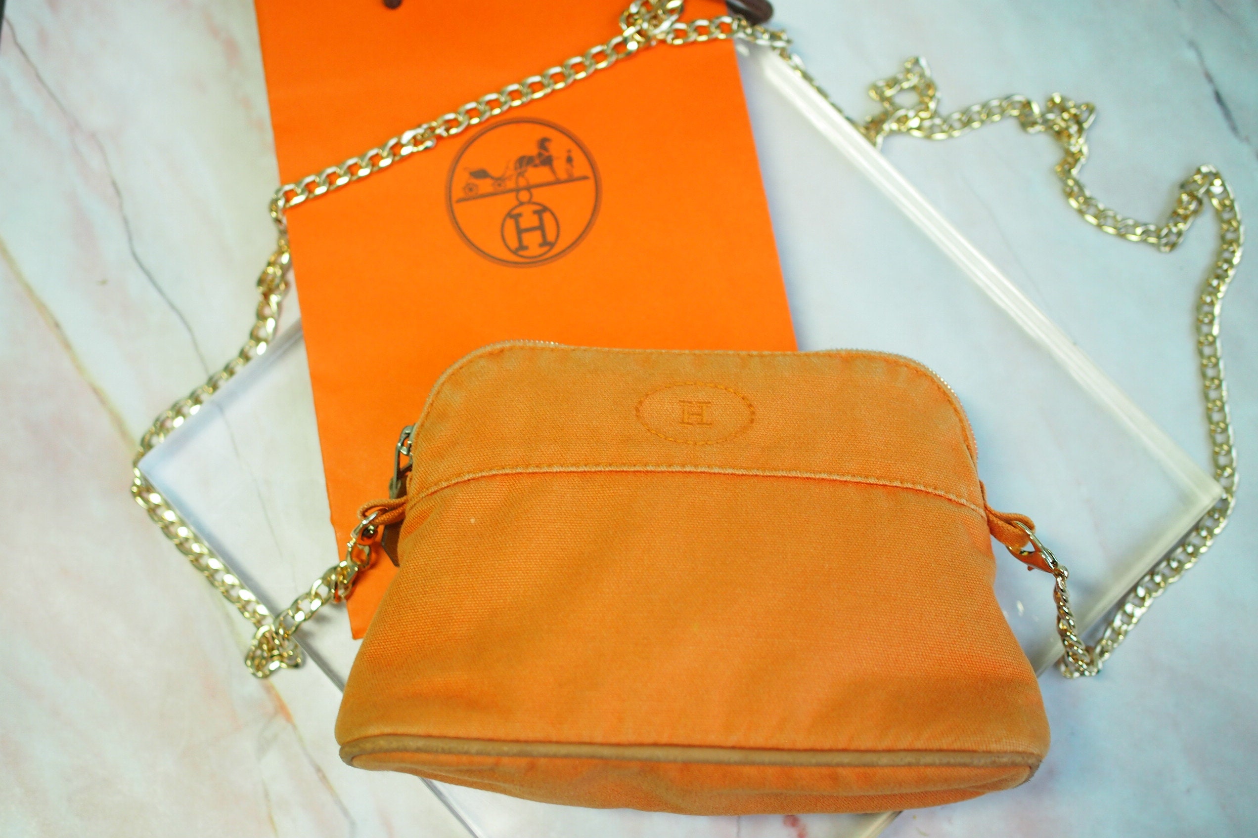 Hermes tas oranje sale