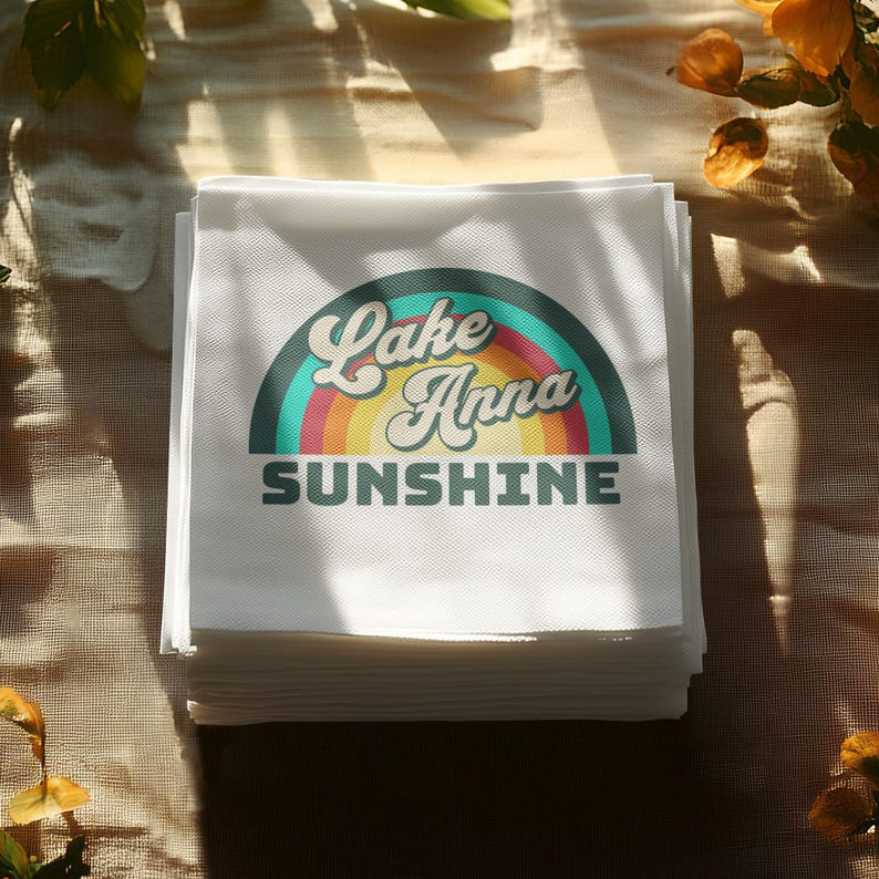 Stack of napkins with "Lake Anna Sunshine" logo and retro rainbow graphic.