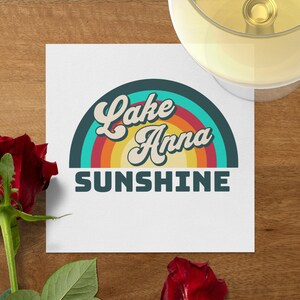 Lake Anna Sunshine retro graphic on a white card with a rose and wine.