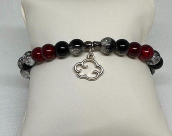 Anime ninja villain group inspired glass beaded charm bracelet