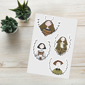 May include: Four illustrated stickers featuring women with different hairstyles and clothing. Each sticker has a floral wreath around the woman's head. The stickers are on a white background.