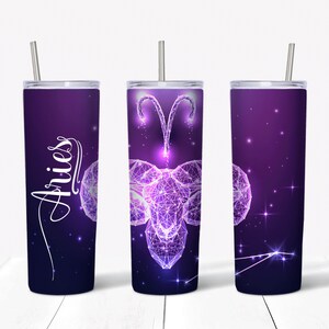 May include: Three stainless steel tumblers with a purple and white design featuring the zodiac sign Aries. The tumblers have a straw and the word "Aries" is written on one of the tumblers.