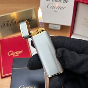 Vintage Cartier 1980 massief 18k goud en inox jasaansteker \ werkt perfect volledige set met alle documenten en garantie \ in goede staat