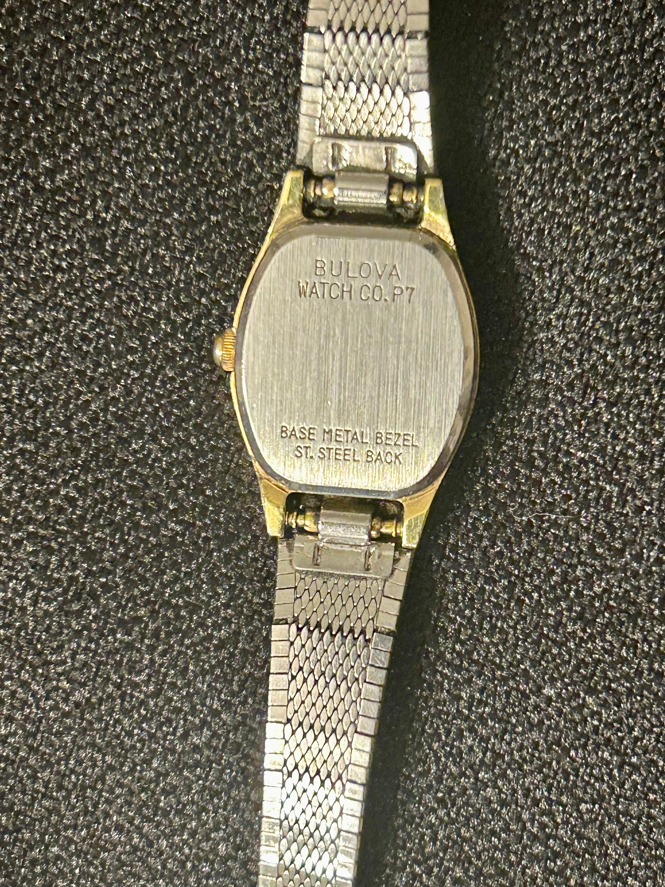Bulova base metal bezel stainless steel back hotsell