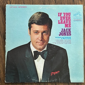 May include: A vintage vinyl record album cover featuring a portrait of Jack Jones in a tuxedo. The album title is "If You Ever Leave Me" and the record label is RCA Victor Dynagroove Recording. The album cover is blue and features a list of songs on the album.