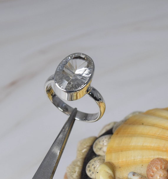10.25 Ratti Jarkan Precious Gemstone Natural Zircon Stone Rashi Ratna  Ashtadhatu Adjustable Silver Ring for Astrological Purpose for Men and  Women : Amazon.in: Jewellery