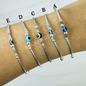 Evil Eye Armband: Verstellbarer Armreif aus 925 Sterlingsilber