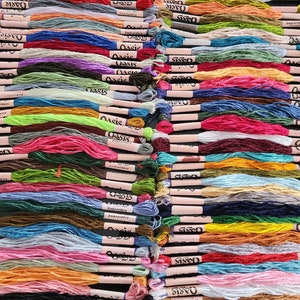 Pack of 100 colorful embroidery skeins made from high-quality material, offering a solid and attractive appearance. Each skein measures 6 to 7 meters in length and consists of 6 strands, allowing for versatile use.