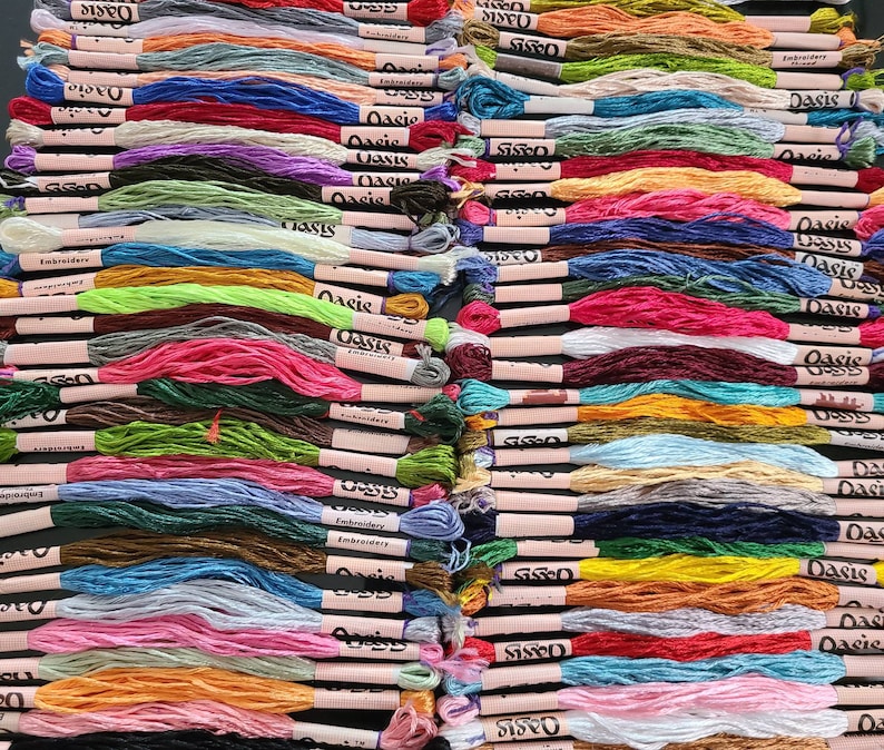 Pack of 100 colorful embroidery skeins made from high-quality material, offering a solid and attractive appearance. Each skein measures 6 to 7 meters in length and consists of 6 strands, allowing for versatile use.