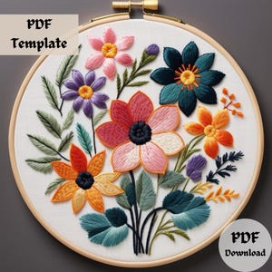 May include: Embroidered floral hoop art with a variety of colorful flowers and leaves. The flowers are in shades of pink, orange, yellow, purple, and teal. The leaves are in shades of green and teal. The hoop is made of wood and has a white background.