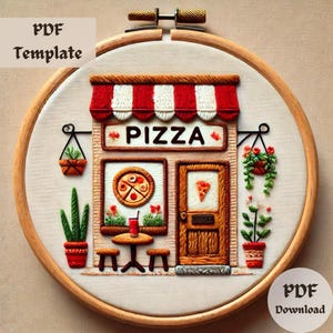 May include: Embroidered design of a red and white striped awning over a small shop with the word "PIZZA" above the door. The shop has a window with a pizza inside and a door with a slice of pizza on it. There are two small tables with chairs and potted plants outside the shop.