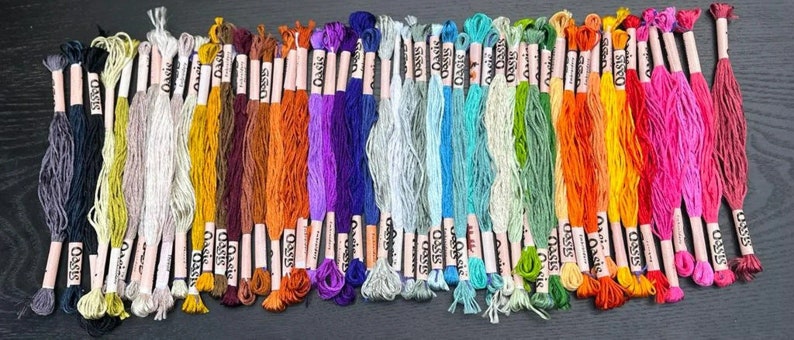 Pack of 100 colorful embroidery skeins made from high-quality material, offering a solid and attractive appearance. Each skein measures 6 to 7 meters in length and consists of 6 strands, allowing for versatile use.