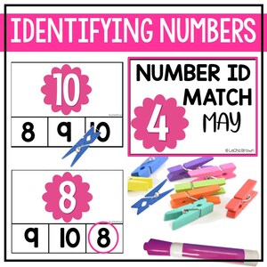 May include: A pink and white number identification activity for kids. The activity includes a number card with the number 10, a number card with the number 8, and a number card with the number 4. The activity also includes a set of colorful clothespins and a pink marker.