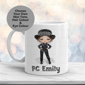 May include: White ceramic mug with a cartoon illustration of a police officer with a black hat and black uniform. The mug has the text "PC Emily" printed on the bottom.