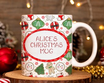 May include: White ceramic mug with a Christmas-themed design. The mug features a repeating pattern of ornaments, snowflakes, and gingerbread men. The center of the mug has a red oval with the text "ALICE'S CHRISTMAS MUG".