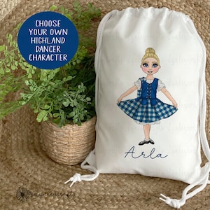 May include: White drawstring bag with a blue and white plaid highland dancer illustration and the name "Arla" printed in blue. The bag is personalized with a custom character.