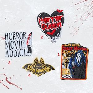 May include: Four iron-on patches with a horror movie theme. The patches are black, red, white, and yellow. The first patch features a ghost holding a knife with the text "Let's watch Scary Movies". The second patch is a black heart with the text "Horror Queen". The third patch is white with the text "Horror Movie Addict" and a red knife. The fourth patch is a black bat with the text "Stay Spooky".