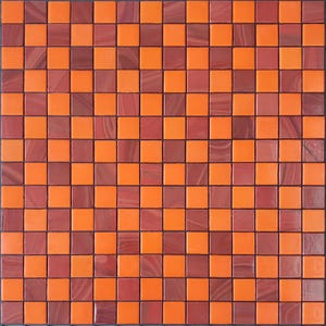 May include: A square mosaic tile sheet featuring a repeating pattern of small, square tiles. The tiles alternate between shades of orange and reddish-brown, creating a visually appealing geometric design. The tiles are evenly spaced and have a glossy finish.
