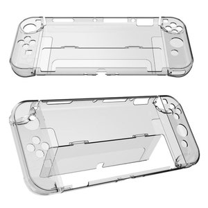 May include: A clear plastic case designed to protect a Nintendo Switch console. The case has cutouts for all the buttons and ports on the console, and it also includes a kickstand.