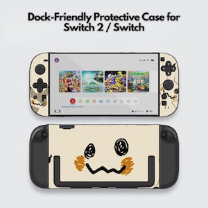 May include: A beige protective case for a Switch 2 / Switch, featuring a cartoon face design. The screen shows game icons. The text "Dock-Friendly Protective Case for Switch 2 / Switch" is at the top.