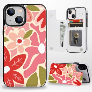 Peut inclure: Une coque de t&eacute;l&eacute;phone blanche avec un motif floral. La coque dispose d'un portefeuille int&eacute;gr&eacute; avec des emplacements pour cartes et de l'argent liquide. La coque est pr&eacute;sent&eacute;e en trois vues diff&eacute;rentes.