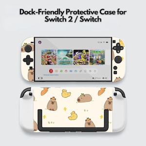 Puede incluir: Una funda protectora para Switch 2 / Switch, con un diseño crema con capibaras, zanahorias y patitos de dibujos animados. La pantalla muestra iconos de juegos. El texto "Dock-Friendly Protective Case for Switch 2 / Switch" está en la parte superior.
