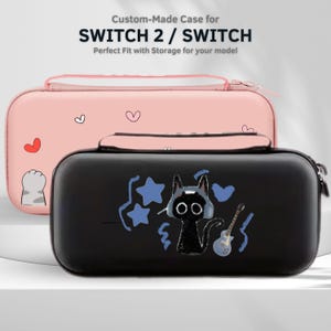 May include: Two custom-made cases for SWITCH 2 / SWITCH. One is black with a cat illustration, stars, and a guitar. The other is pink with hearts and a cat paw. The cases have zippers and are designed for storage.