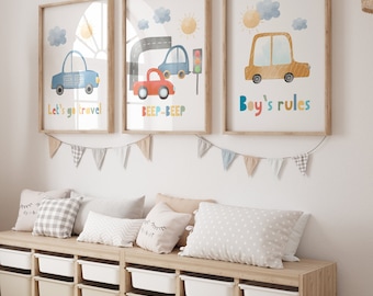May include: Three framed watercolor prints with a car theme. The prints feature a blue car with the text "Let's go travel", a red car with the text "Beep-Beep", and a yellow car with the text "Boy's rules".