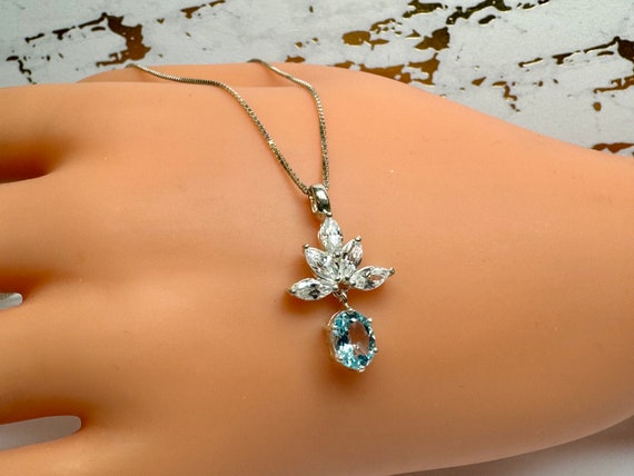 Floral 925 Sterling Silver Necklace: White CZ Blue Stone Pendant