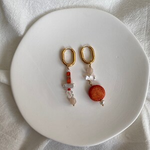 Asymmetrical red and gold dangle drop earrings