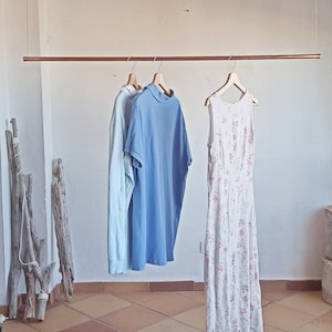 Copper wardrobe hanging from the ceiling, copper clothes rail, open hanging wardrobe, Kupfer Kleiderständer, clothes rack