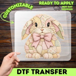 May include: A DTF transfer featuring a patchwork bunny with a pink gingham bow. The bunny is made of various pastel fabrics. The transfer is on a clear sheet with the words "Customizable" and "Ready to Apply" and "Next Day Shipping".