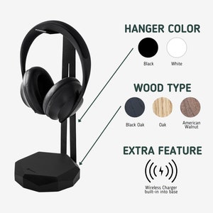 Puede incluir: Soporte para auriculares negro con cargador inal&aacute;mbrico integrado en la base. El soporte est&aacute; hecho de madera y tiene un acabado de roble negro. La percha es negra.