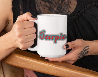 May include: White ceramic mug with a black and red graphic that says "Scorpio".